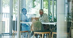 Business, people and meeting with document in office for accounting, finance report and proposal. Men, mature manager and team with paperwork on budget, financial statement and investment information