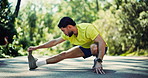 Running, stretching and legs with man in nature for muscle, fitness and workout preparation. Sports athlete, warm up and training with person outdoor for exercise, cardio challenge and health