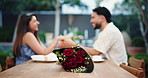 Love, bouquet or couple in restaurant with hand holding, gift or bonding together in anniversary celebration. Honeymoon, man or woman in relationship with rose, present or affection in romantic date.