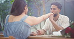 Holding hands, kiss and love with couple in restaurant for valentines day, roses and romance. Anniversary celebration, flower bouquet and gift with man and woman for support, care and marriage date