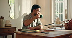 Remote work, coffee and man on laptop in home for article, website content and copywriting. Freelancer, morning and person on computer with drink for publishing, editing review and magazine story