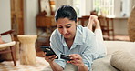 Credit card, relax and woman with phone on sofa in home for online shopping, ecommerce or checkout. Cellphone, debit and female person with website for store payment in living room at apartment.
