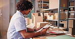 Man, reading and clipboard for ecommerce startup to check stock, supply chain and shipping details. Person, writing and documents on inventory checklist, quality assurance and order info for delivery