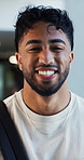 Face, college student and man on campus with smile for scholarship, higher education and degree. Confident, happy person and pride at university for academic growth, study goals or skill development.