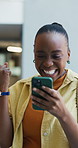 University student, fist pump or black woman with phone in hallway, results release or scholarship success. Achievement, winner or person with celebration for online announcement, mobile or excited