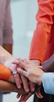 Teamwork, stack and hands of business people in office for collaboration, partnership and synergy. Startup, diversity and closeup of workers together for agreement, solidarity and goals in workplace