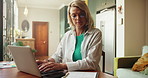 Woman, laptop and documents with remote work from home, typing and admin with glasses in morning. Person, computer and virtual assistant with paperwork, report and review with freelance job at house