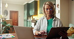 Woman, laptop and tablet with remote work from home, typing or web design with glasses in morning. Person, computer and freelance job with tech, app or creative review for project management at house