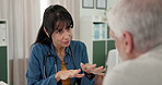 Consultation, doctor and old man in clinic, conversation and appointment with feedback for treatment. Pensioner, patient and woman in office, medical service or checkup with discussion and advice