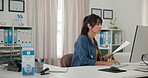 Hospital, doctor and woman with document, computer and medical research with patient records on web. Typing, info and mature person with diagnosis on paperwork, healthcare or think of treatment plans