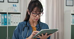 Doctor, online and woman with tablet, office and reading diagnosis on website, thinking and browsing. Review, test results and mature person with tech for healthcare, scroll and info in hospital