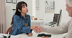Consultation, doctor and old man in clinic, handshake and thank you with feedback for treatment. Shaking hands, patient or woman with advice, medical service or appointment with recovery or healing