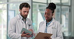 Discussion, clipboard and doctors on tablet in hospital for diagnosis, consulting and advice. Healthcare, documents and man with woman on tech for patient report, medical research or planning surgery
