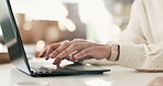 Typing, online and hands with laptop in office, copywriting and research for email marketing on web. Creative, person and copywriter with technology, ad campaign and editing blog post or project