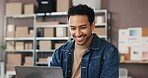 Man, laptop and happy with typing for dropshipping, sales report or ecommerce order at startup. Person, computer and smile with logistics, boxes or notes for inventory management at storage warehouse