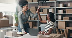 Shipping, team or high five with laptop in small business for courier deal, bulk order or good news. Logistics, happy women and tech with celebration for startup growth, positive reviews and success
