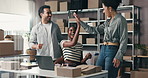 Shipping, team or high five with laptop in warehouse for bulk order, logistics milestone or success. Distribution, happy people or tech with celebration for startup growth or supply chain achievement
