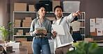 Team, tablet and pointing with clipboard in logistics for stock control, shipping checklist or update. Small business, people and tech with discussion in warehouse for inventory and storage backlog