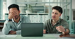 Frustrated, businessmen and laptop with bad news for project failure, poor investment or loss. Upset, disappointed or male people with computer for mistake, bankruptcy or financial debt in office