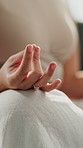 Woman, closeup or hands with meditation in home for breathing exercise, chakra balance or yoga. Zen, female person or relax with lotus pose for inner peace, mindfulness or spiritual healing in house