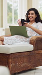 Happy woman, laptop and scroll with phone at resort for social media joke, text message and chat. Person, laugh and typing with tech at hotel for online meme, funny conversation and internet humor.