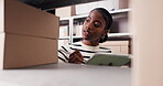 Boxes, tablet and writing with black woman in storage depot for inventory or logistics management. App, pen and supply chain with African person in office for delivery, shipping schedule or stock
