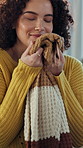 Laundry, smell or woman in house with scarf, clothes maintenance or fresh scent in spring cleaning. Satisfaction, comfort or girl in home with material, domestic chores or inhale of fabric softener.