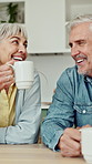 Conversation, coffee and senior couple in kitchen in home for laugh, bonding or connection together. Smile, love and elderly man with woman for drinking warm beverage in morning with support in house