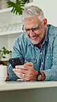 Old man, phone and laugh with coffee in house, texting and happy with notification for funny chat. Senior person, smartphone and hands with mobile app, contact or smile with social media at apartment
