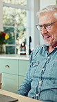 Senior, happy man and good news with laptop in home for retirement bonus, pension or relief. Elderly, male person or pensioner with computer or app for winning, online investment or annuity in house