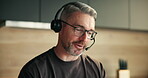 Tech support, agent and man with headset, home and talking with contact or help with troubleshooting. Happy, virtual assistant and mature person with mic for chat, problem solving and IT solution