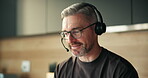 Tech support, consultant and man with headset, home and  help with troubleshooting or communication. Happy, virtual assistant and mature person with mic for chat, problem solving and IT solution