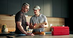 Mature man, plumber and talk with clipboard in kitchen, invoice or price for repair service in home. People, maintenance checklist and discussion with toolbox, sink and solution for leak at apartment