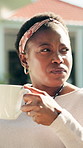 Thinking, backyard and black woman with coffee in morning to relax, rest and calm on weekend. Garden, reflection and African person with drink, beverage and tea for peaceful, fresh air and wellness