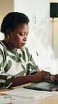 Documents, laptop and finance with black woman in home for budget report, banking statement and audit review. Mortgage payment, online account and invoice bills with person in apartment for tax