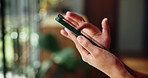 Hands, person and typing with phone at house for social media, browsing website and texting. Closeup, woman or mobile for communication, message contact and review notification of chat update in home