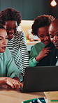 Hug, laptop and search with African family in home dining room for holiday or vacation planning. Computer, excited or pointing with kids and parents in apartment together for online booking of hotel