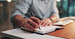 Hands, man and writing notes in office for article research, story planning and publishing schedule. Journalist, person and notebook at agency for column information, creative ideas and news summary