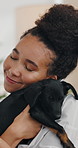 Happy, hug and woman with dog in home for love, adoption or care together in living room. Smile, animal and female person embracing puppy pet for bonding, connection and cuddle for relax in apartment