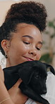 Smile, hug and woman with dog in home for love, adoption or care together in living room. Happy, animal and female person embracing puppy pet for bonding, connection and cuddle for relax in apartment
