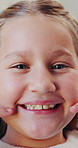 Face, happy child and point at teeth with dental wellness, oral care or gum health with patient. Portrait, tooth and girl with hygiene for fresh breath, orthodontics checkup or smile for appointment
