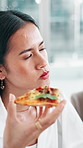 Lunch break, thinking and woman with pizza in office, eating fast food or contemplating proposal. Hungry, work pause or financial advisor with takeaway meal in startup, investment ideas or reflection