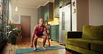 Dumbbells, fitness and pilates with woman in living room of home for training or workout. Exercise, squat and weights with person in apartment for health, physical activity or wellness routine
