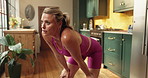 Fitness, sweating and tired with woman in kitchen of home for training or workout fatigue. Exercise, pilates and recovery with exhausted person in apartment for commitment or dedication to health