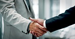 Business, people and meeting with handshake in office for welcome, introduction and partnership. Closeup, staff and shaking hands for greeting, deal agreement and thank you of negotiation opportunity