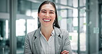 Business woman, arms crossed and face in office with confidence, ambition and smile for finance career. Pride, portrait and consultant with job satisfaction, management or entrepreneur in startup