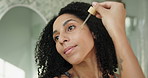 Skincare, facial serum or woman in bathroom with pipette, hydration or vitamin C benefits in soft skin. Dermatology, glow or girl in house with oil dropper, collagen or shine in anti aging treatment.
