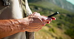 Hiker, outdoor or hands typing with phone for route information, navigation app and digital trail map. Location sharing, fitness or person check website for trekking direction, mobile or connection