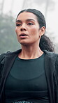 Fitness, woman and tired with breathing in rain outdoor for cardio challenge, running burnout or rest. Athlete, person and fatigue in cold weather for exercise recovery, intense workout or overworked