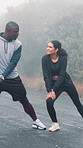 Mist, fitness or couple with stretching in road to start running, getting ready or exercise support. Bonding, interracial people and leg warm up in fog for sports performance and workout preparation